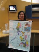 Meriam Findlay, Filipino coordinator with Philippines map - over 7000 islands in the country! 